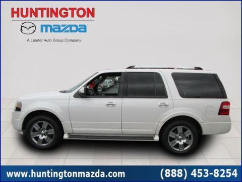 2009 Ford Expedition - This white Ford Expedition SUV is shown from the side, with its wheels and body clearly visible.