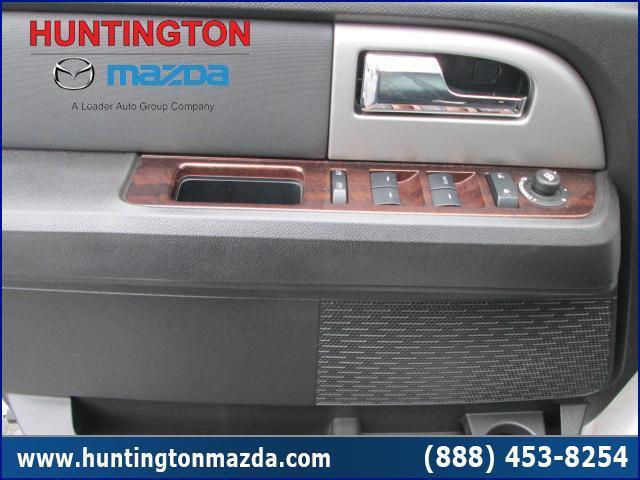 Interior door panel with wood trim and power window controls