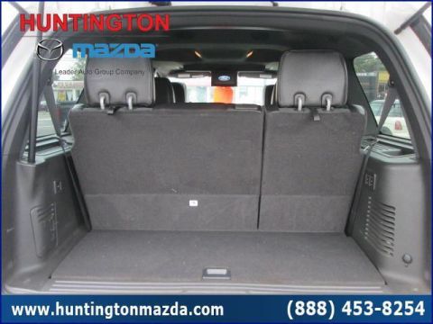 2009 Ford Expedition - The interior of a black SUV's cargo area is shown from the rear.