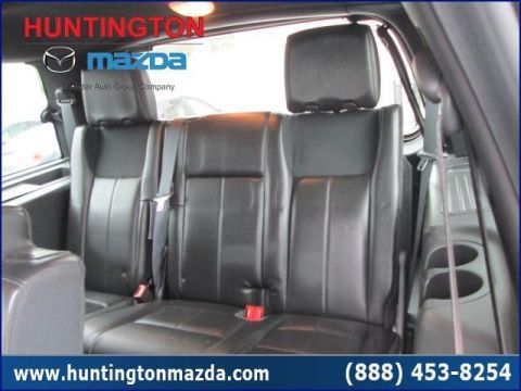 2009 Ford Expedition - Interior view of vehicle rear seats with seatbelts visible. Watermark indicates Huntington Mazda.
