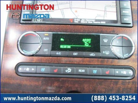 2009 Ford Expedition - Climate control panel for a 2009 Ford Expedition, displaying the temperature and heated seat options.