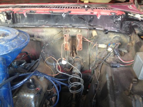 1978 Ford Bronco - Close-up view of the engine bay, focusing on the brake system components and associated wiring.