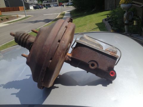 1978 Ford Bronco - A rusty brake booster and master cylinder assembly is shown, likely a replacement part.