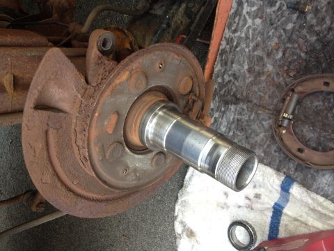 1978 Ford Bronco - This image shows a disassembled wheel hub and brake drum assembly, with significant rust visible on the components.