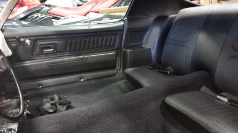 1970 Chevrolet Camaro - Interior of a 1970 Chevrolet Camaro, black seats and door panels.