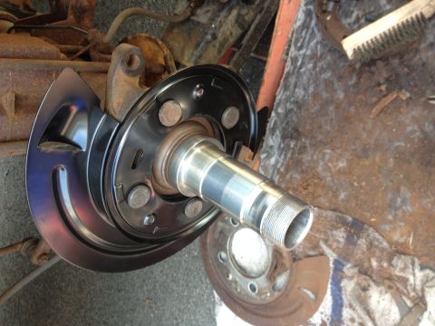 1978 Ford Bronco - This photo shows a vehicle's brake rotor and hub assembly, likely during a repair or replacement process.