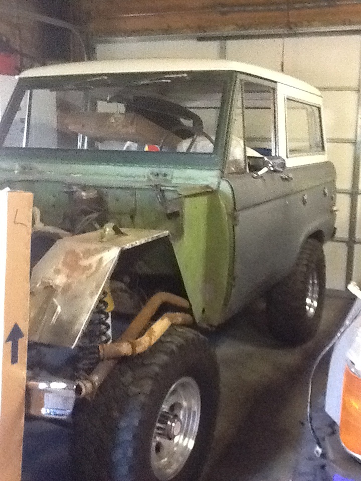 1978 Ford Bronco undergoing restoration, front fender removed