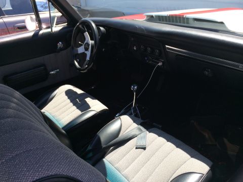 1968 Ford Mustang - Interior of a 1969 Chevrolet Chevelle SS, bucket seats and a floor-mounted shifter.