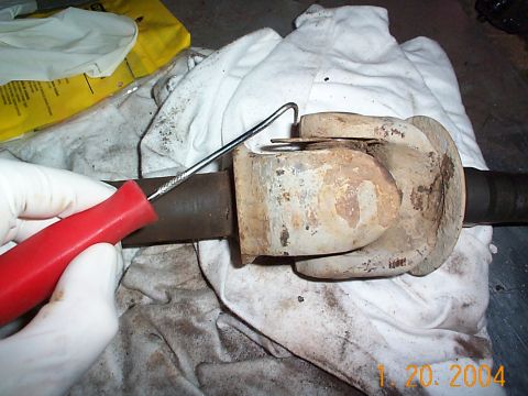 1992 Ford Bronco - Taking the c-clips out was a little difficult, I was able to get this one out with a pick, but the other ones I had to use a punch. There w…