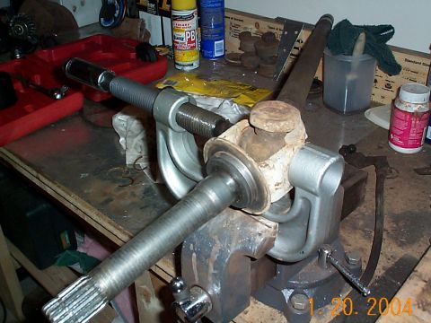 1992 Ford Bronco - Using the balljoint press to push the caps out, these were in pretty tight so it took a little effort. Make sure after you push the one sid…