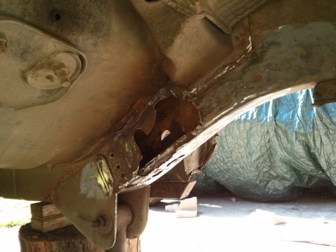 1986 Ford Bronco - This photo shows a severely rusted vehicle frame, indicating extensive corrosion and potential structural issues.