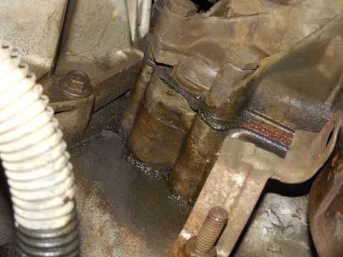 1975 Ford Bronco - While it was up on the lift, I noticed some coolant on the oil pan, and I followed it up to the timing cover gasket on the R side. See the…