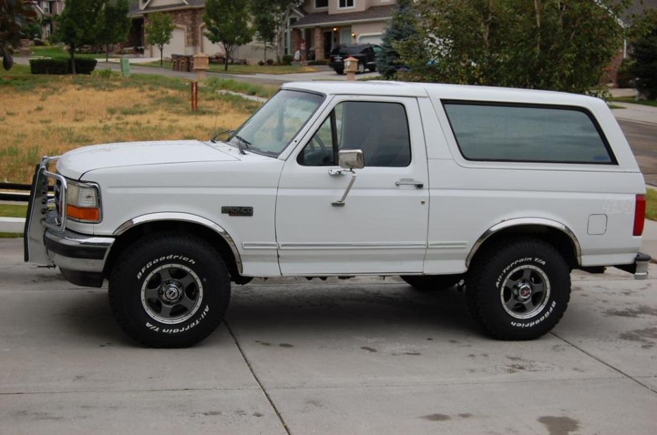 White 1995 Ford Bronco side view