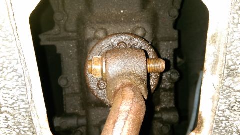 1996 Ford F-150 - Shifter Nut was originally on the Right side of the bolt. Photo shows nut loosened from right side, placed on left side, and tightened on l…