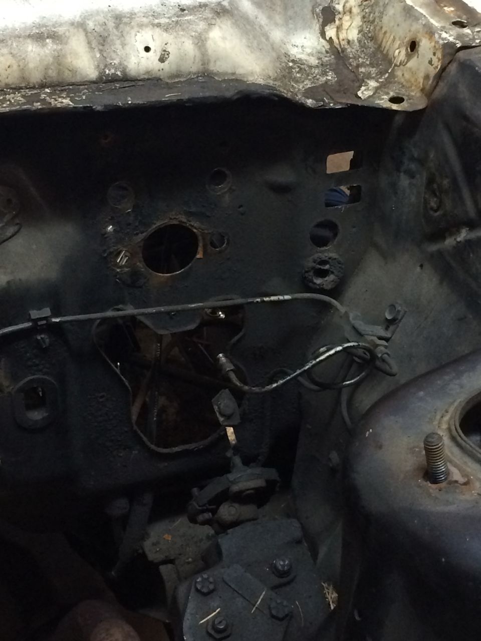1964 Ford Fairlane engine bay, showing firewall and steering components