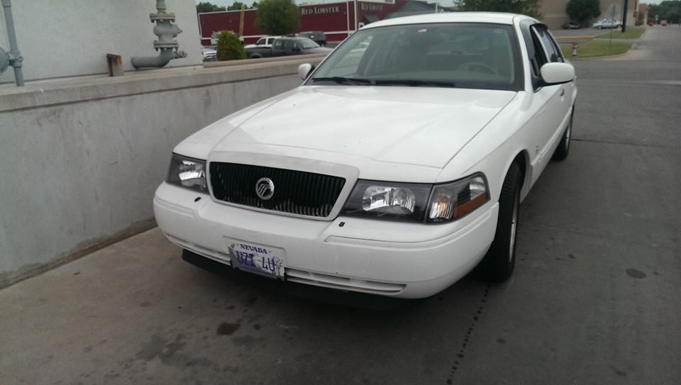 White 2000 Mercury Grand Marquis with Nevada license plate