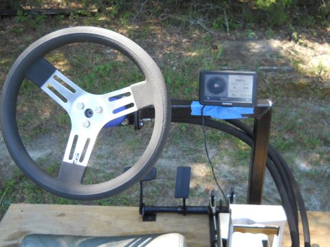1992 Ford Bronco - Aftermarket steering wheel and Garmin GPS unit are set up for testing.