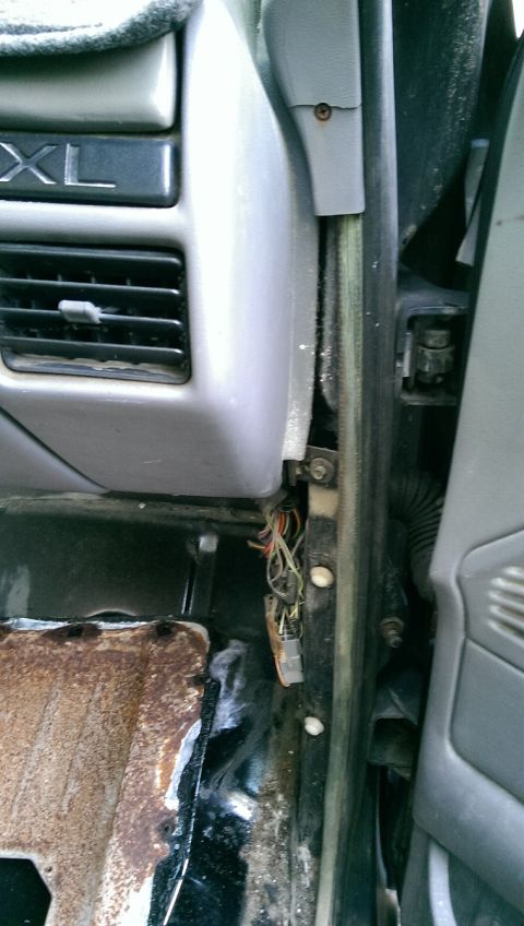 1996 Ford F-150 - Interior view of a 1996 Ford F-150, revealing exposed wiring and dashboard components.