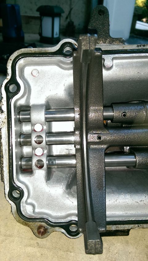 1996 Ford F-150 - Close-up view of the internal components of a transmission, showing shift forks and rails.