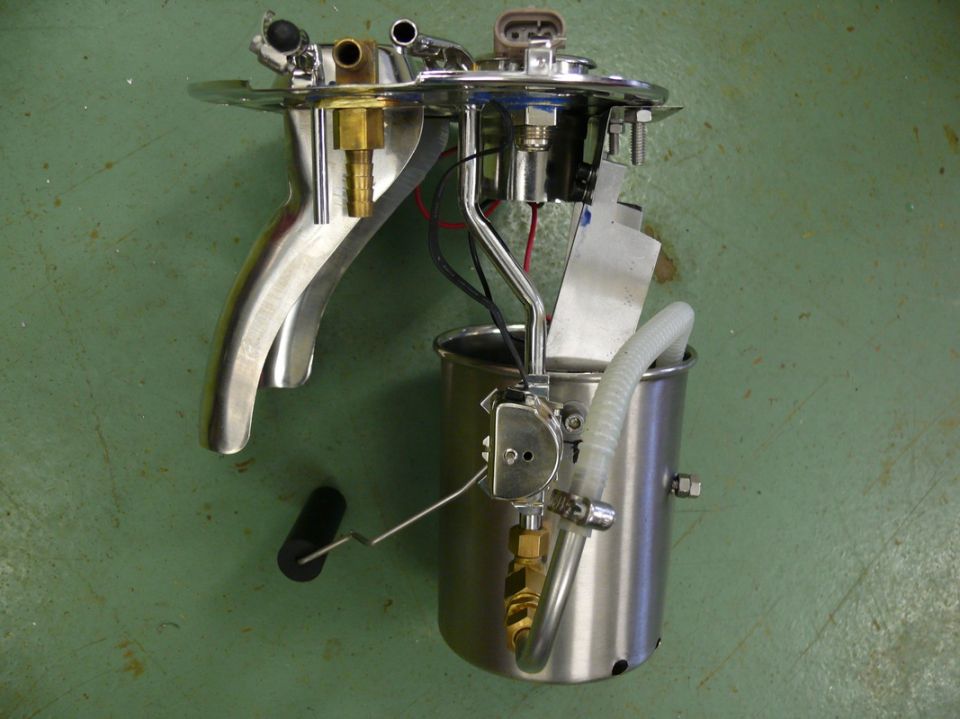 Fuel pump assembly with chrome accents and a float arm