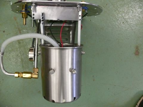 Fuel pump assembly with stainless steel canister, white hose, and brass fittings