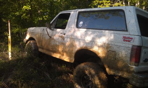 1990 Ford Bronco - This 1990 Ford Bronco is covered in mud after an off-road excursion.