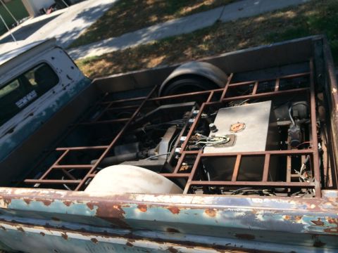 1968 Ford Mustang - Custom frame and fuel tank installed in the bed of a pickup truck.