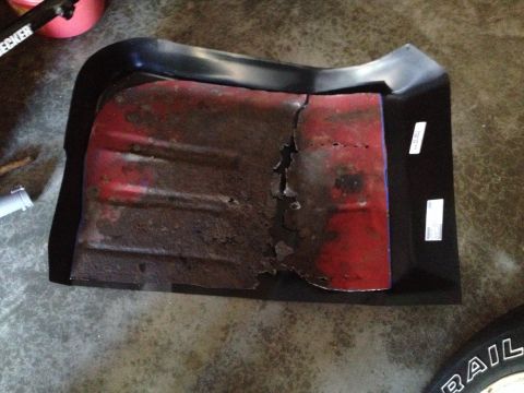 1978 Ford Bronco - This heavily rusted floor pan shows significant damage and wear.