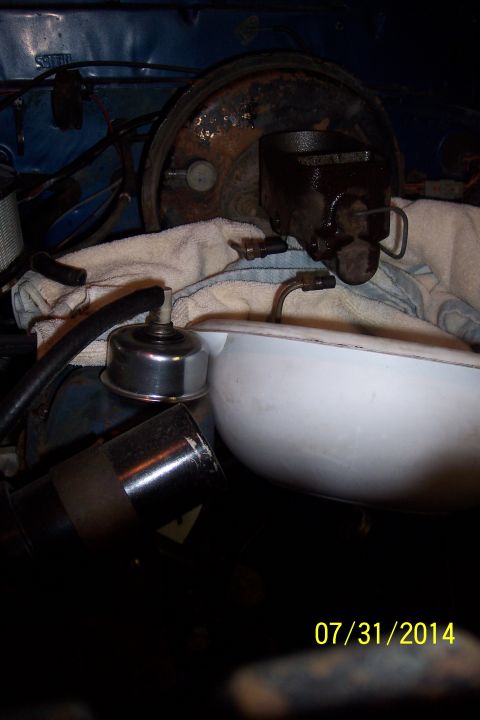 1978 Ford Bronco - Close-up view of a brake booster and master cylinder assembly, likely from an older vehicle.