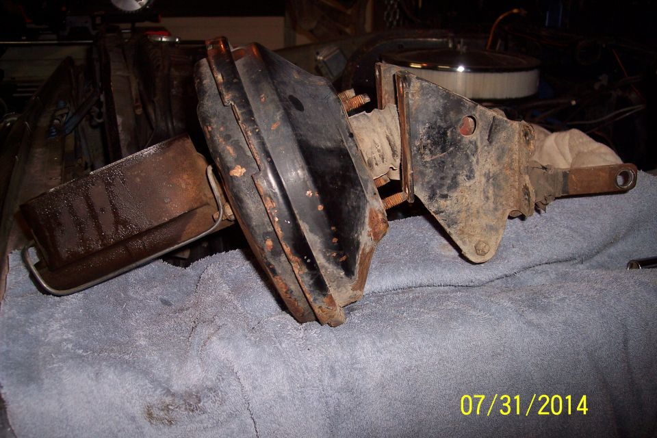 brake booster and master cylinder assembly on a blue towel