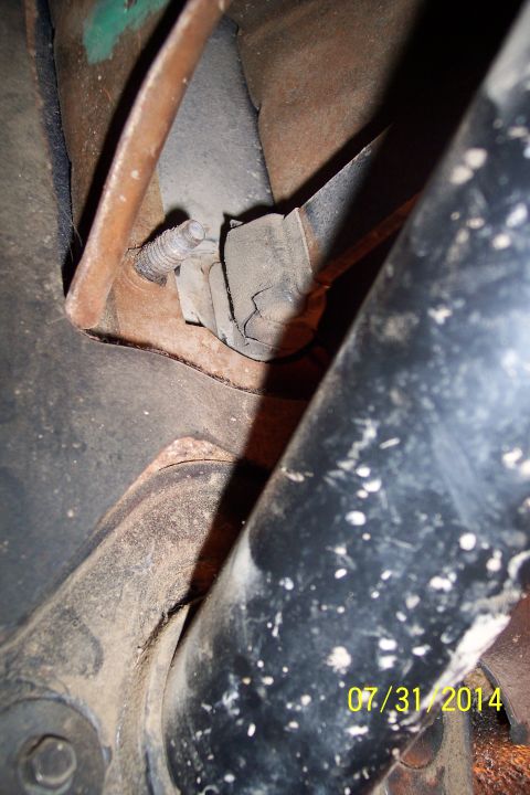 1978 Ford Bronco - This image shows a close-up view of a vehicle's brake line bracket, with a date stamp visible in the corner.