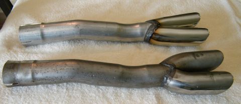 1968 Mercury Cougar - Comparison of a polished exhaust tip set next to a used set, with a Supermotors.net watermark.