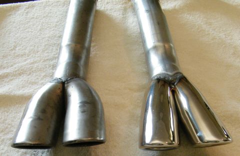 1968 Mercury Cougar - Pair of dual exhaust tips, one polished chrome and one raw metal, laid out on a towel.