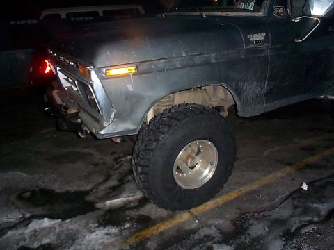1979 Ford Bronco - Front fender and wheel of a 1979 Ford F-Series truck.