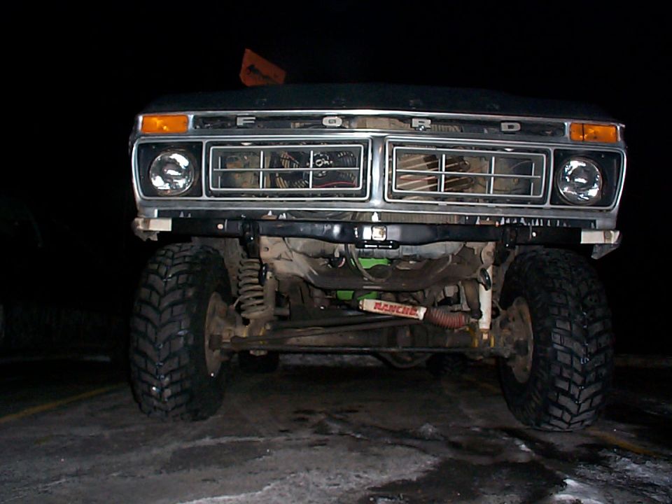 1979 Ford Bronco front view with chrome grille and off-road tires