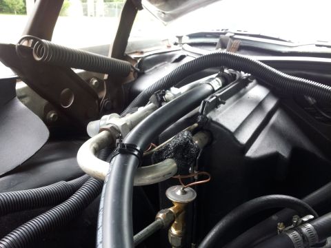 1976 Ford Ranchero - The air conditioning system components are visible in the engine compartment.