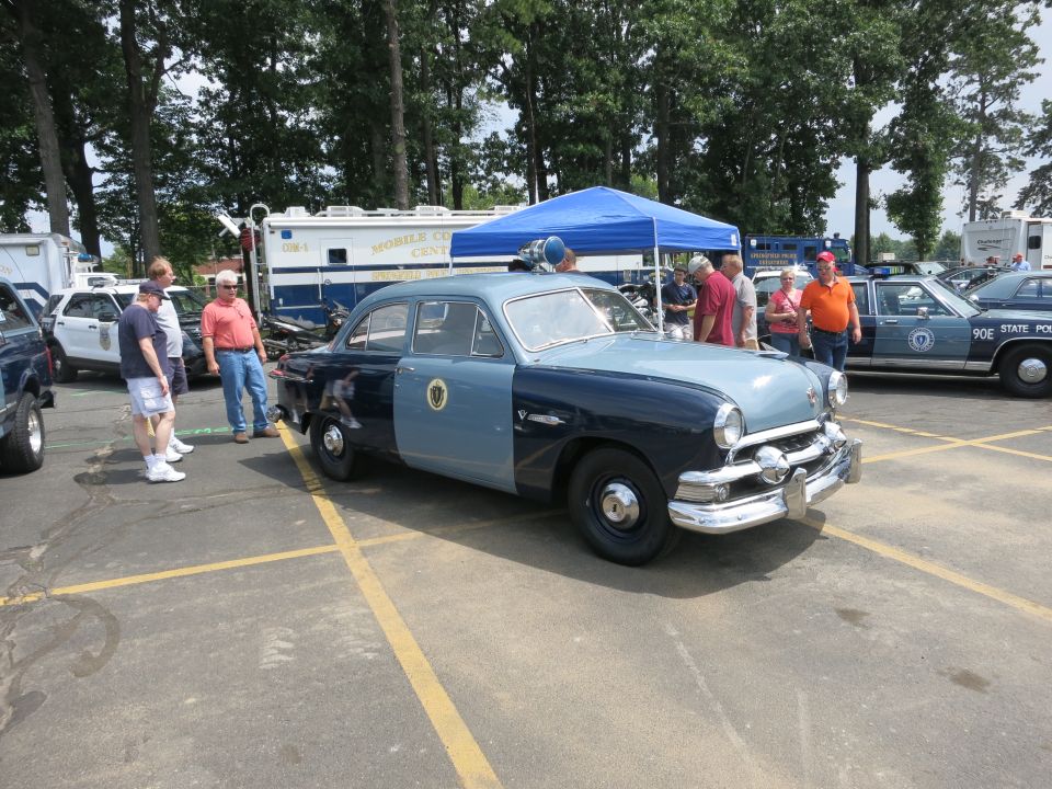 Vintage two-tone blue restored police sedan at car show