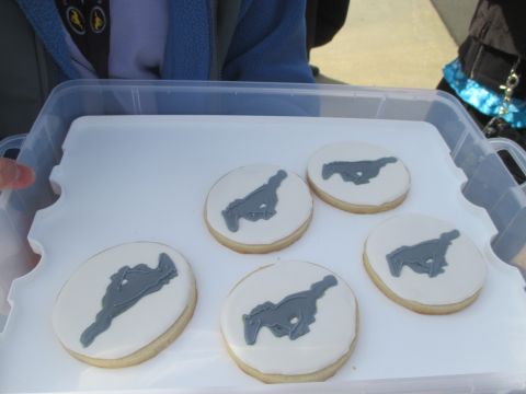 2003 Ford Crown Victoria - A tray of cookies decorated with a grey horse logo, possibly representing a Ford Mustang.