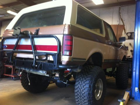 1988 Ford Bronco - This lifted Ford Bronco has a custom rear bumper and spare tire carrier.