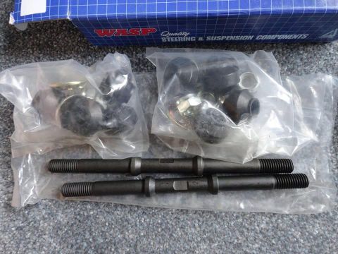 1999 Ford Fairlane - WASP brand steering and suspension components are packaged for sale, with a blue box visible in the background.