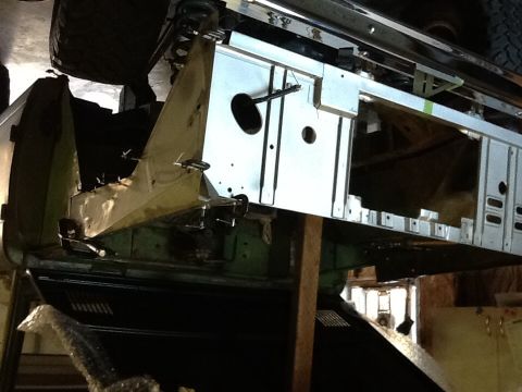 1988 Suzuki Samurai - Underside view of a vehicle's frame and suspension components during repair or modification.