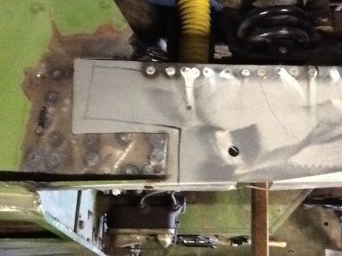 1988 Suzuki Samurai - Metal fabrication work on a vehicle's chassis, indicating repair or modification.