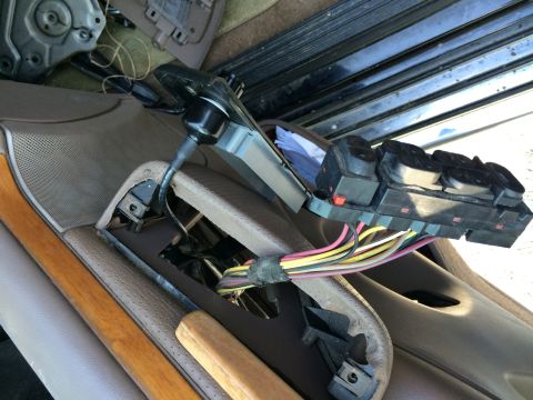 1997 Ford F-350 - Wiring harness and control module exposed after removing interior door panel.