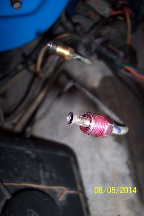1978 Ford Bronco - Close-up of a brake line fitting, showing the connection point for a brake hose.