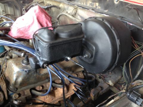 1978 Ford Bronco - Close-up of brake booster and master cylinder assembly in an engine bay.