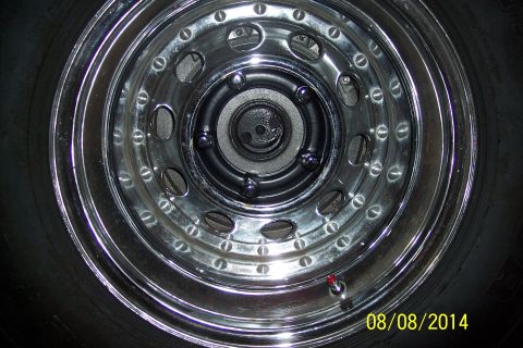 1978 Ford Bronco - Close-up of a chrome wheel and tire, with a visible date stamp of 08/08/2014.