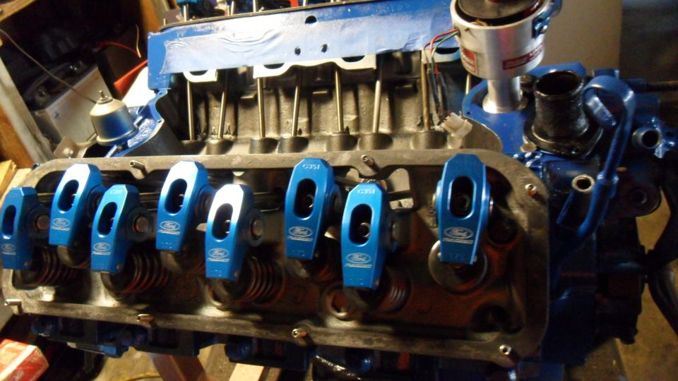 Close-up of blue Ford racing rocker arms on an engine block