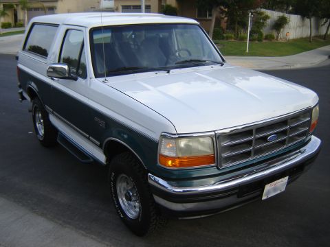 1996 Ford Bronco - This two-tone Ford Bronco is shown from a three-quarter front view on a sunny day.