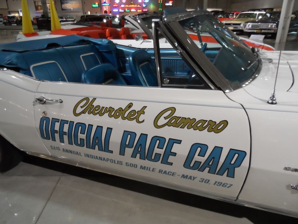 White convertible with blue interior, "Chevrolet Camaro OFFICIAL PACE CAR 51st ANNUAL INDIANAPOLIS 500 MILE RACE - MAY 30, 1967" text