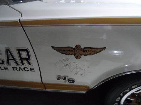 1971 Ford Ranchero - Detail of a car door showing racing decals and autographs.